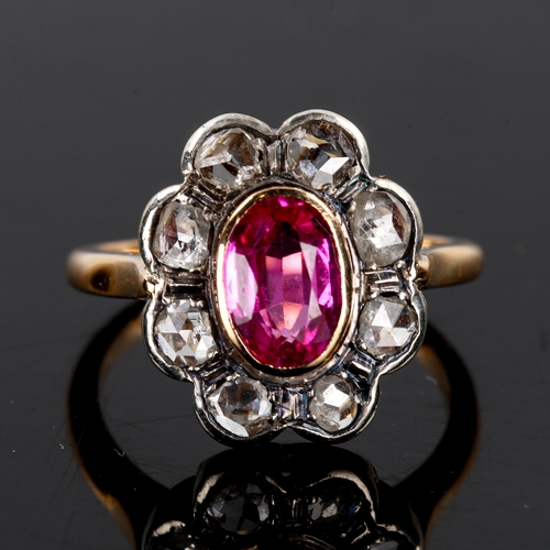 252 - An 18ct gold synthetic ruby and diamond cluster ring, set with oval mixed cut ruby and rose cut diam... 