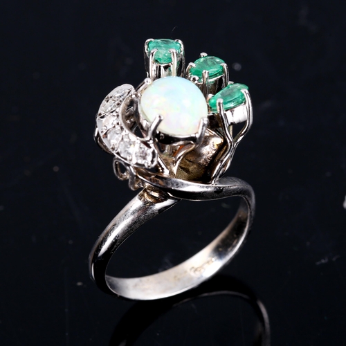 254 - A late 20th century 18ct white gold opal, emerald and diamond cocktail ring, set with round cabochon... 