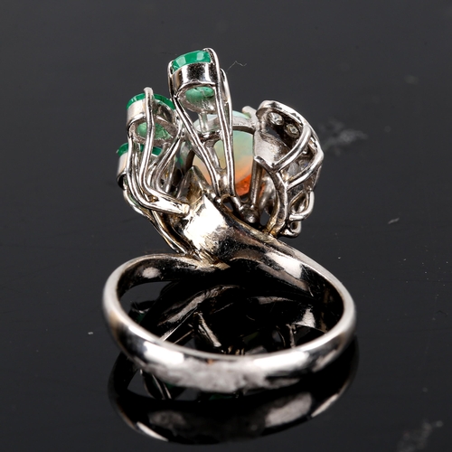 254 - A late 20th century 18ct white gold opal, emerald and diamond cocktail ring, set with round cabochon... 