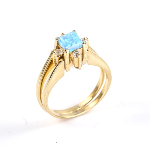 256 - A Turkish 14ct gold opalique and cubic zirconia swivel reversible ring, set with square cabochon opa... 