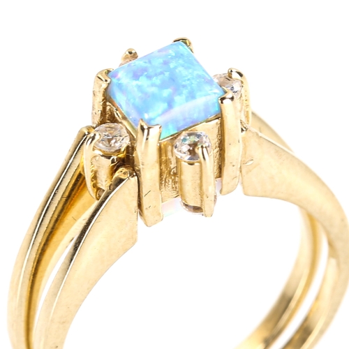 256 - A Turkish 14ct gold opalique and cubic zirconia swivel reversible ring, set with square cabochon opa... 