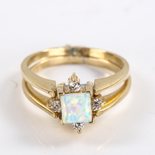 256 - A Turkish 14ct gold opalique and cubic zirconia swivel reversible ring, set with square cabochon opa... 