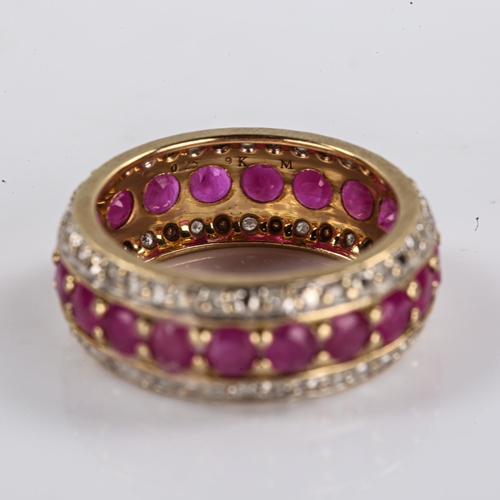 258 - A modern 9ct gold ruby and diamond full eternity band ring, set with round cut rubies and single cut... 