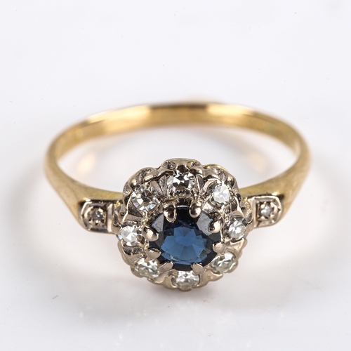 266 - A late 20th century 18ct gold sapphire and diamond cluster ring, set with round cut sapphire and sin... 