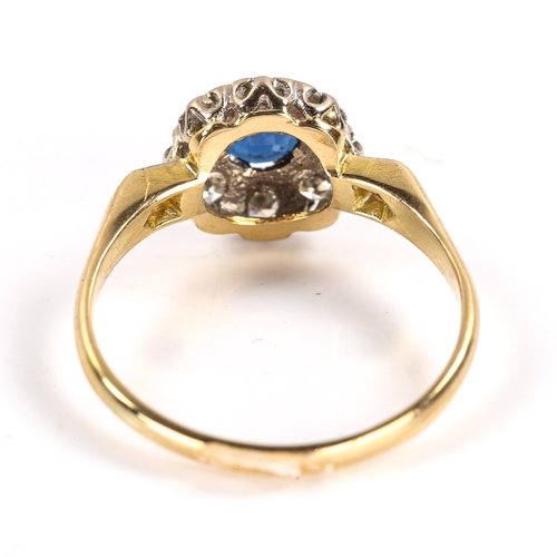 266 - A late 20th century 18ct gold sapphire and diamond cluster ring, set with round cut sapphire and sin... 