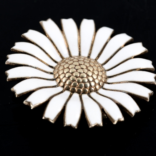 269 - ANTON MICHELSEN - a Vintage Danish vermeil sterling silver and white enamel daisy pattern brooch, br... 