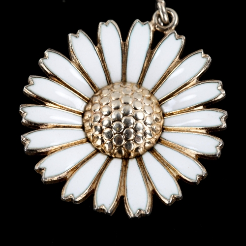 272 - VIGGO PEDERSEN - a Danish vermeil sterling silver and white enamel daisy pattern pendant, and BENT G... 