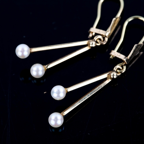 278 - HERMANN SIERSBOL - a pair of Danish 14ct gold pearl drop earrings, with hook and clip fittings, over... 