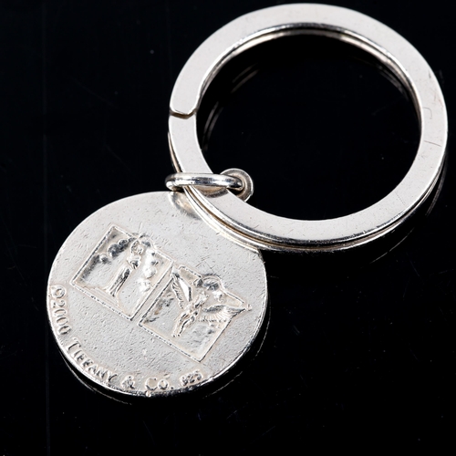 287 - TIFFANY & CO - a modern sterling silver globe keyring, dated 2000, globe diameter 22.5mm, 13g