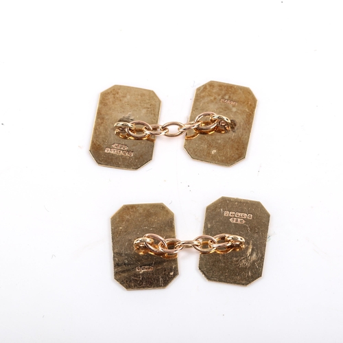 294 - A pair of mid-20th century 9ct gold octagonal panel cufflinks, engine turned and polished decoration... 