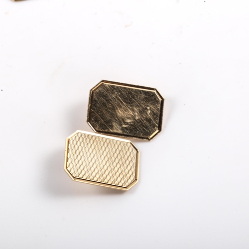 294 - A pair of mid-20th century 9ct gold octagonal panel cufflinks, engine turned and polished decoration... 