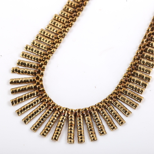 295 - A late 20th century 9ct gold graduated fringe necklace, domed brick links, necklace length 41cm, 14.... 