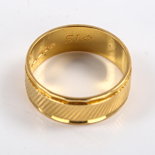 296 - A mid-20th century 22ct gold wedding band ring, engraved decoration, maker's marks S and W, hallmark... 