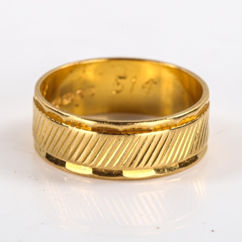 296 - A mid-20th century 22ct gold wedding band ring, engraved decoration, maker's marks S and W, hallmark... 