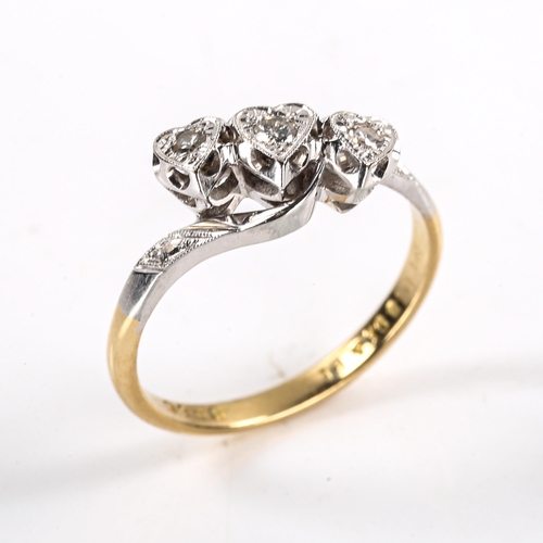 299 - An early 20th century 18ct gold diamond triple heart ring, platinum tops set with round brilliant an... 