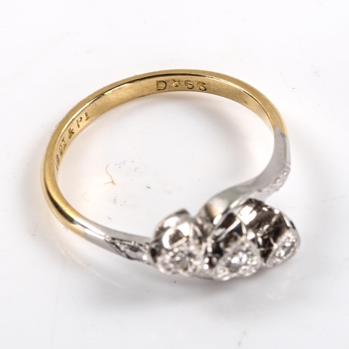 299 - An early 20th century 18ct gold diamond triple heart ring, platinum tops set with round brilliant an... 