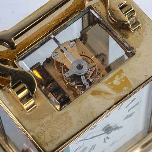 84 - J W BENSON - a brass cased carriage clock, white enamel dial with Roman numerals and exhibition glas... 