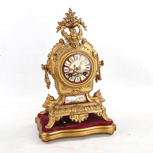 86 - An early 20th century French gilt-metal 8-day mantel clock, hand painted watercolour dial with Roman... 