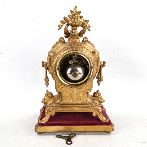 86 - An early 20th century French gilt-metal 8-day mantel clock, hand painted watercolour dial with Roman... 