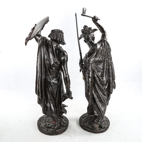 1464 - A pair of 19th century bronze patinated spelter figures of Native warriors, height 63cm