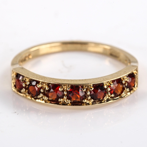 304 - A late 20th century 9ct gold garnet half eternity ring, set with round cut garnets, hallmarks London... 