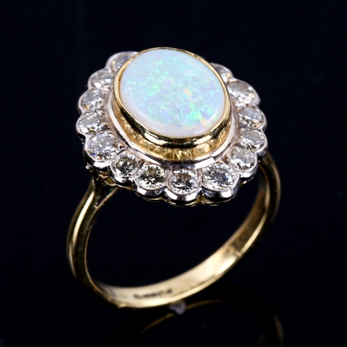 315 - A late 20th century 18ct gold opal and diamond cluster ring, set with oval cabochon white opal and m... 