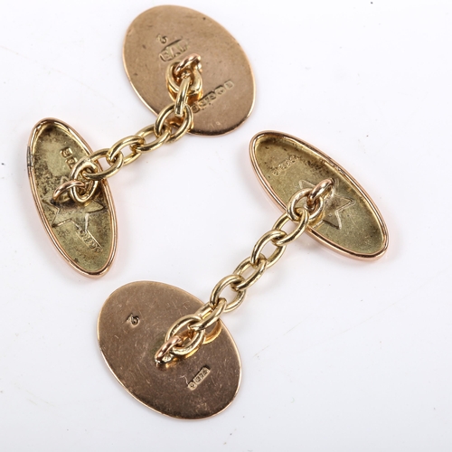 321 - A pair of early 20th century 9ct gold oval panel cufflinks, engine turned decoration, hallmarks Birm... 