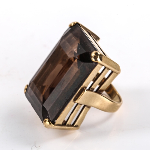 322 - A large mid-20th century 9ct gold smoky quartz dress ring, set with emerald step-cut quartz, hallmar... 