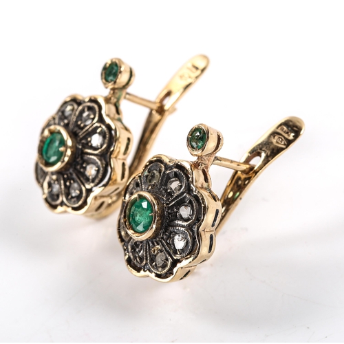 334 - A pair of Continental gold and silver emerald and diamond cluster earrings, late 20th century, set w... 