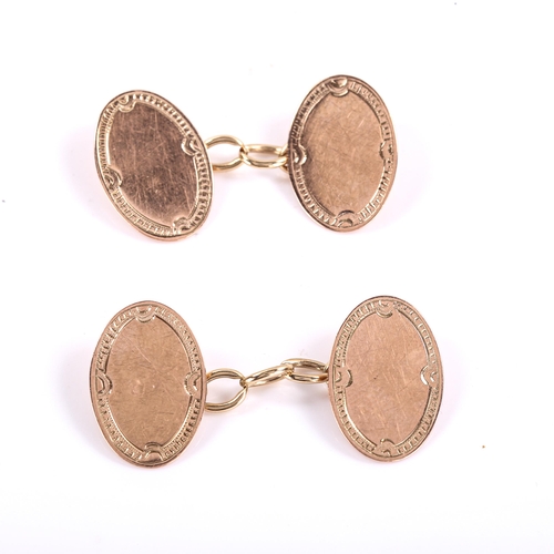 338 - A pair of early 20th century 9ct rose gold oval panel cufflinks, engine turned decoration, hallmarks... 