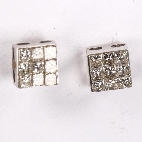 469 - A modern pair of Princess diamond cluster stud earrings, unmarked white metal settings, total diamon... 