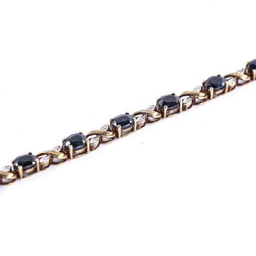 471 - A modern 9ct gold sapphire and diamond bracelet, set with oval mixed-cut sapphires and single-cut di... 