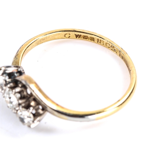 473 - An early 20th century 18ct gold 3-stone diamond crossover ring, set with old-cut diamonds, total dia... 