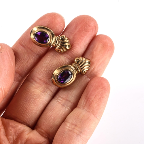 477 - A pair of late 20th century 9ct gold amethyst flaming torch stud earrings, set with oval mixed-cut a... 