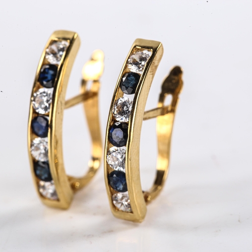 480 - A pair of Continental 18ct gold stone set half hoop earrings, set with round-cut sapphires and CZs, ... 