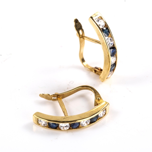 480 - A pair of Continental 18ct gold stone set half hoop earrings, set with round-cut sapphires and CZs, ... 