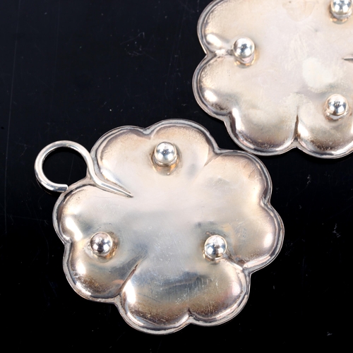 484 - CARTIER LIMITED - a pair of George V silver 4-leaf clover dishes, hallmarks London 1932, width 7cm