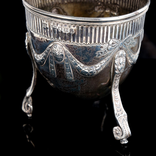 485 - *WITHDRAWN*A George III silver sugar bowl, ovoid form with relief embossed Adams style swag decorati... 