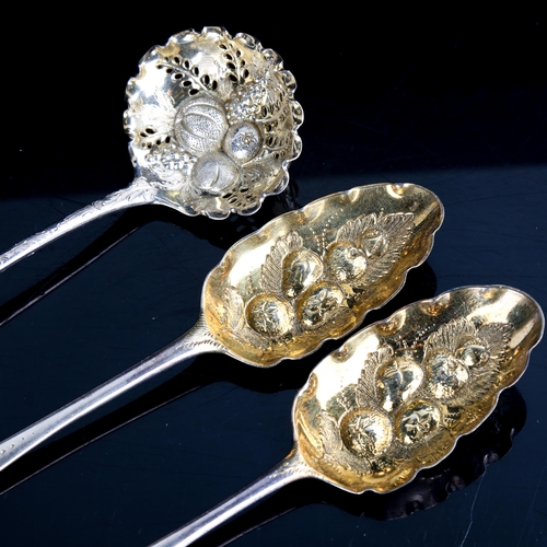 487 - 3 x George III silver berry spoons, comprising pair of spoons and a sifter spoon, relief embossed de... 