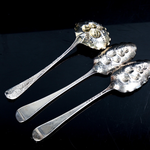 487 - 3 x George III silver berry spoons, comprising pair of spoons and a sifter spoon, relief embossed de... 