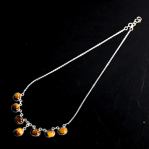 516 - A modern silver tiger's eye fringe necklace, set with cabochon tiger's eye, necklace length 40cm, 8.... 