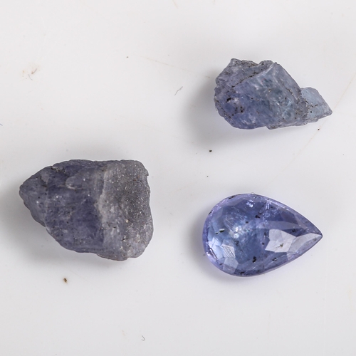 529 - 3 unmounted tanzanites, including 2.04ct pear mixed-cut and 2 rough-cuts, all with certificates (3)