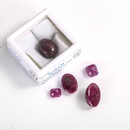 530 - 2 unmounted mixed-cut rubies, including 10ct oval cabochon star ruby, 1.53ct octagonal step-cut ruby... 