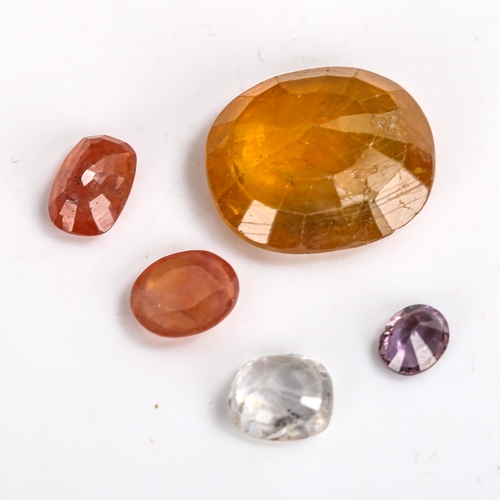 531 - 5 unmounted coloured sapphires, colours include yellow, orange and purple-pink, all with certificate... 