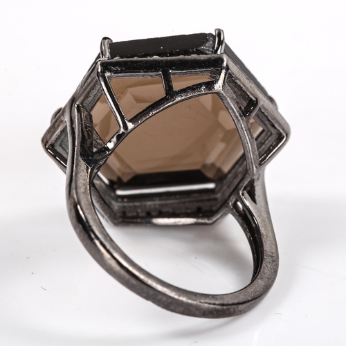 540 - A modern oxidised silver smoky quartz and diamond cluster ring, set with hexagonal step-cut quartz a... 