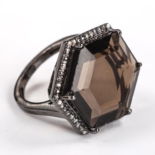 540 - A modern oxidised silver smoky quartz and diamond cluster ring, set with hexagonal step-cut quartz a... 