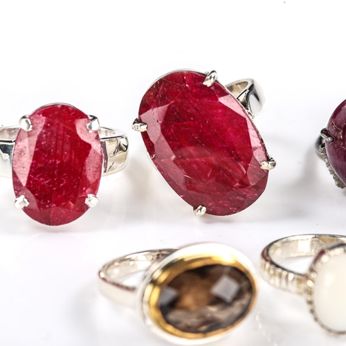 541 - Various modern silver gem set rings, gem stones include cabochon ruby, rectangular step-cut sapphire... 