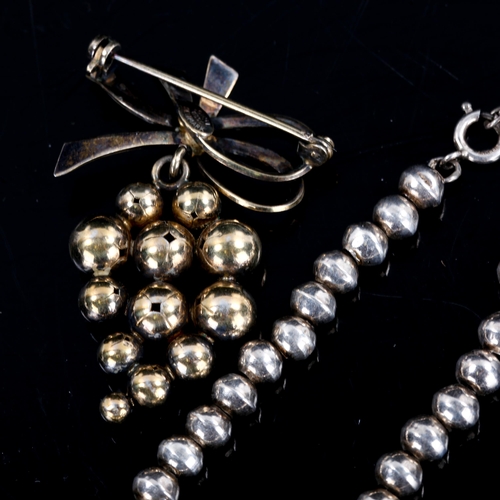 545 - A modern sterling silver graduated bead necklace, and a Danish vermeil silver grapes drop brooch, ne... 