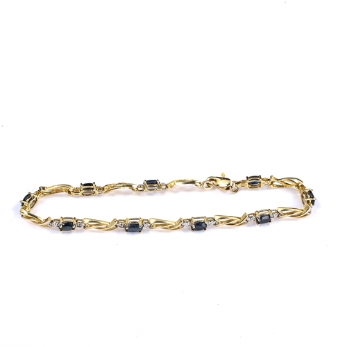 565 - A modern 9ct gold sapphire bracelet, set with oval mixed-cut sapphires, bracelet length 18cm, 5g