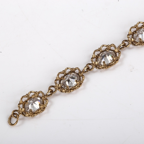 567 - A modern 9ct gold stone set bracelet, set with oval mixed-cut stones, bracelet length 19.5cm, 9.2g